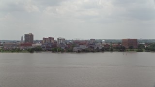 4.8K aerial stock footage of office buildings by the Potomac River in Alexandria, Virginia Aerial Stock Footage | AX74_031