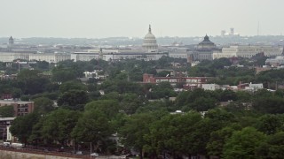 4.8K aerial stock footage of the domes of United States Capitol and Thomas Jefferson Building in Washington DC Aerial Stock Footage | AX74_042