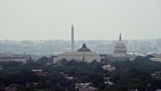 AX74_056E - 4.8K aerial stock footage of the United States Capitol, Thomas Jefferson and John Adams Buildings, and the Washington Monument in Washington DC