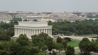 4.8K aerial stock footage orbiting the Lincoln Memorial and green trees in Washington DC Aerial Stock Footage | AX74_097