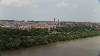 4.8K aerial stock footage of Georgetown University seen from the Potomac River in Washington DC Aerial Stock Footage | AX74_104