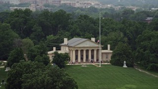 AX74_111 - 4.8K aerial stock footage of tour groups on the front steps of Arlington House at Arlington National Cemetery, Washington DC