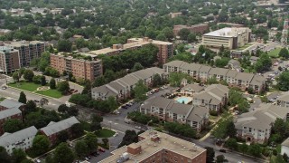 AX74_119 - 4.8K aerial stock footage flying by apartment complexes in Arlington, Virginia