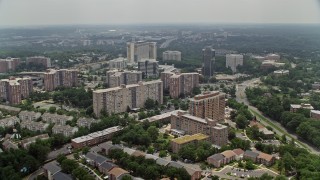 4.8K aerial stock footage flying over apartment complexes, hotel and office buildings in Alexandria, Virginia Aerial Stock Footage | AX74_122E