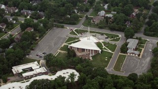 4.8K aerial stock footage approaching and tilting to Queen of the Apostles Catholic Church in Alexandria, Virginia Aerial Stock Footage | AX74_125