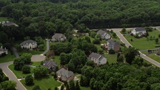 4.8K aerial stock footage flying over beautiful homes in Fairfax Station, Virginia  Aerial Stock Footage | AX74_140