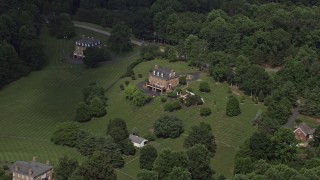 4.8K aerial stock footage approaching and tilting down to isolated home in the country, Clifton, Virginia Aerial Stock Footage | AX75_010