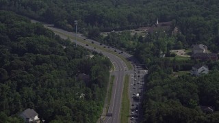 4.8K aerial stock footage of small rural churches and homes by Ox Road in Fairfax Station, Virginia Aerial Stock Footage | AX75_014E