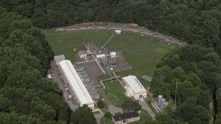 4.8K aerial stock footage approaching and tilting to industrial buildings in Springfield, Virginia Aerial Stock Footage | AX75_022