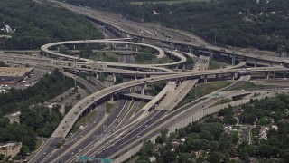 AX75_025 - 4.8K aerial stock footage approaching I-495 and 395 freeway interchange in Springfield, Virginia