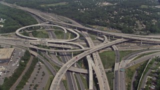 AX75_026E - 4.8K aerial stock footage approaching the I-495 / I-395 freeway interchange with light traffic in Springfield, Virginia