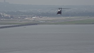 4.8K aerial stock footage of a helicopter flying over the Potomac River near Alexandria, Virginia Aerial Stock Footage | AX75_044