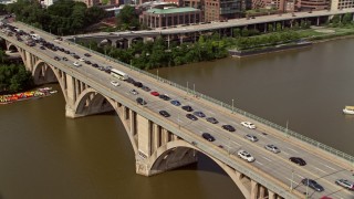 4.8K aerial stock footage of heavy traffic on the Francis Scott Key Bridge in Washington DC Aerial Stock Footage | AX75_122