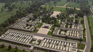 AX75_135 - 4.8K aerial stock footage approaching a monument at Arlington National Cemetery in Washington DC