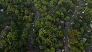 4.8K aerial stock footage of a bird's eye view of neighborhood and high school baseball fields, Springfield, Virginia, sunset Aerial Stock Footage | AX76_021