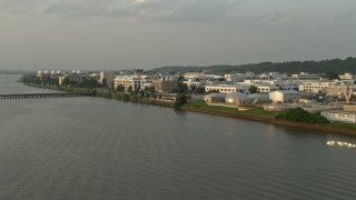 4.8K aerial stock footage flying by United States Naval Research Laboratory, Washington, D.C., sunset Aerial Stock Footage | AX76_035