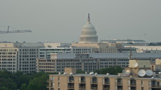 4.8K aerial stock footage flying by United States Capitol dome, Washington D.C., sunset Aerial Stock Footage | AX76_042E