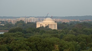 4.8K aerial stock footage approaching the Jefferson Memorial with tourists, Washington D.C., sunset Aerial Stock Footage | AX76_059