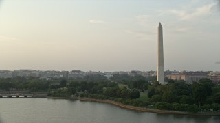 4.8K aerial stock footage of the Old Executive Office Building, The White House, and Washington Monument, Washington D.C., sunset Aerial Stock Footage | AX76_065