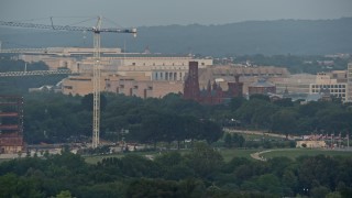 4.8K aerial stock footage of Smithsonian Castle in Washington D.C., sunset Aerial Stock Footage | AX76_071