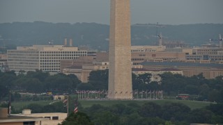 4.8K aerial stock footage he base of Washington Monument in the National Mall, Washington D.C., sunset Aerial Stock Footage | AX76_072