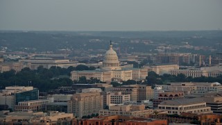 4.8K aerial stock footage flying by the United States Capitol, Washington D.C., sunset Aerial Stock Footage | AX76_080E