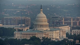 AX76_082 - 4.8K aerial stock footage of the United States Capitol, Washington D.C., sunset