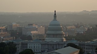 4.8K aerial stock footage of the United States Capitol, revealing Washington Monument, Washington D.C., sunset Aerial Stock Footage | AX76_089