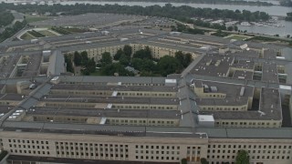 AX76_124E - 4.8K aerial stock footage orbiting The Pentagon, Washington, D.C., twilight