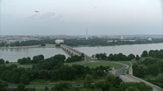 4.8K aerial stock footage of Lincoln Memorial, Washington Monument seen from Arlington Memorial Bridge, Washington, D.C., twilight Aerial Stock Footage | AX76_129