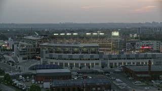 AX76_145 - 4.8K aerial stock footage flying by Nationals Park during a baseball game, Washington, D.C., twilight