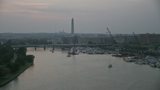 4.8K aerial stock footage of Washington Monument and Francis Case Memorial Bridge, Washington, D.C., twilight Aerial Stock Footage | AX76_147