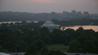 4.8K aerial stock footage of the Jefferson Memorial beside Tidal Basin in Washington, D.C., twilight Aerial Stock Footage | AX76_149