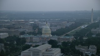 4.8K aerial stock footage of United States Capitol, Washington Monument, and the Thomas Jefferson Building, Washington, D.C., twilight Aerial Stock Footage | AX76_167