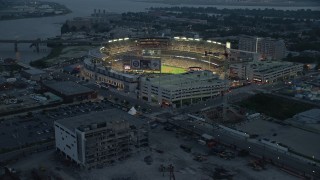 4.8K aerial stock footage approaching Nationals Park during a baseball game, Washington, D.C., twilight Aerial Stock Footage | AX76_170E