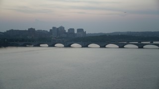 4.8K aerial stock footage of Arlington Memorial Bridge spanning the Potomac River, Washington, D.C., twilight Aerial Stock Footage | AX76_180