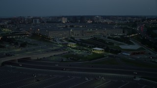 4.8K aerial stock footage approaching The Pentagon in Washington, D.C., night Aerial Stock Footage | AX76_186