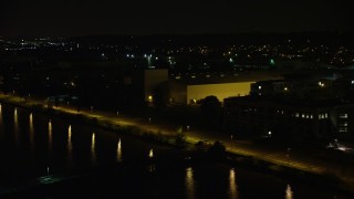 4.8K aerial stock footage flying by the United States Naval Research Laboratory by the Potomac River, Washington, D.C., night Aerial Stock Footage | AX77_021