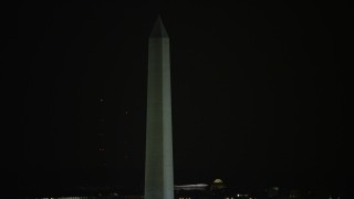 4.8K aerial stock footage of the famous Washington Monument in Washington, D.C., night Aerial Stock Footage | AX77_038