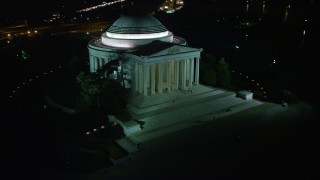 4.8K aerial stock footage of the Jefferson Memorial with visitors in Washington, D.C., night Aerial Stock Footage | AX77_045