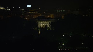 4.8K aerial stock footage of The White House seen from the base of the Washington Monument, Washington, D.C., night Aerial Stock Footage | AX77_047E