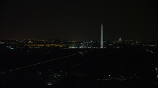 4.8K aerial stock footage of Washington Monument, National Mall, Capitol Building, Lincoln Memorial, Washington, D.C., night Aerial Stock Footage | AX77_058