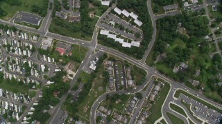 4.8K aerial stock footage of a bird's eye view of town homes, row houses and apartment buildings in Manassas, Virginia Aerial Stock Footage | AX78_013