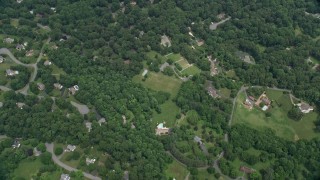 4.8K aerial stock footage of a bird's eye view of upscale homes, roads and pond, Herndon, Virginia Aerial Stock Footage | AX78_027