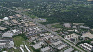 4.8K aerial stock footage of Inter-Denominational Church and stores Woodfield Road, Gaithersburg, Maryland Aerial Stock Footage | AX78_046