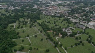 AX78_081E - 4.8K aerial stock footage of Loudon Park Funeral Home and Cemetery in Baltimore, Maryland