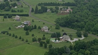 4.8K aerial stock footage of rural homes and a farm by Cullum Road in Abigdon, Maryland Aerial Stock Footage | AX78_147E