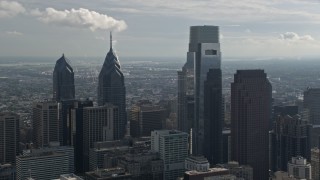 4.8K aerial stock footage of One and Two Liberty Place, Comcast Center, Three Logan Square in Downtown Philadelphia, Pennsylvania Aerial Stock Footage | AX79_010