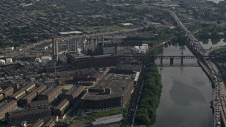 4.8K aerial stock footage of Veolia Energy power plant next to the Schuylkill River Philadelphia, Pennsylvania Aerial Stock Footage | AX79_028