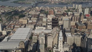 AX79_055 - 4.8K aerial stock footage flying over convention center and office buildings, approaching Benjamin Franklin Bridge, Downtown Philadelphia, Pennsylvania